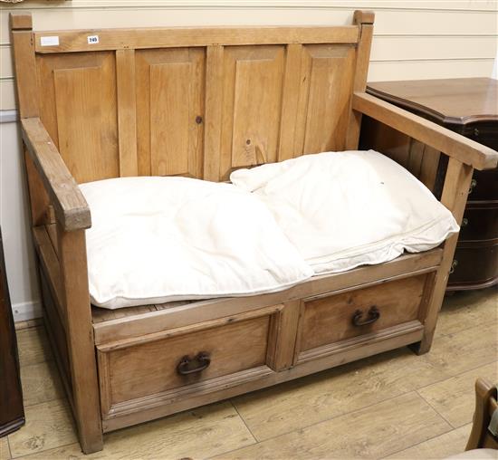 A pine settle with two drawer base, W.126cm